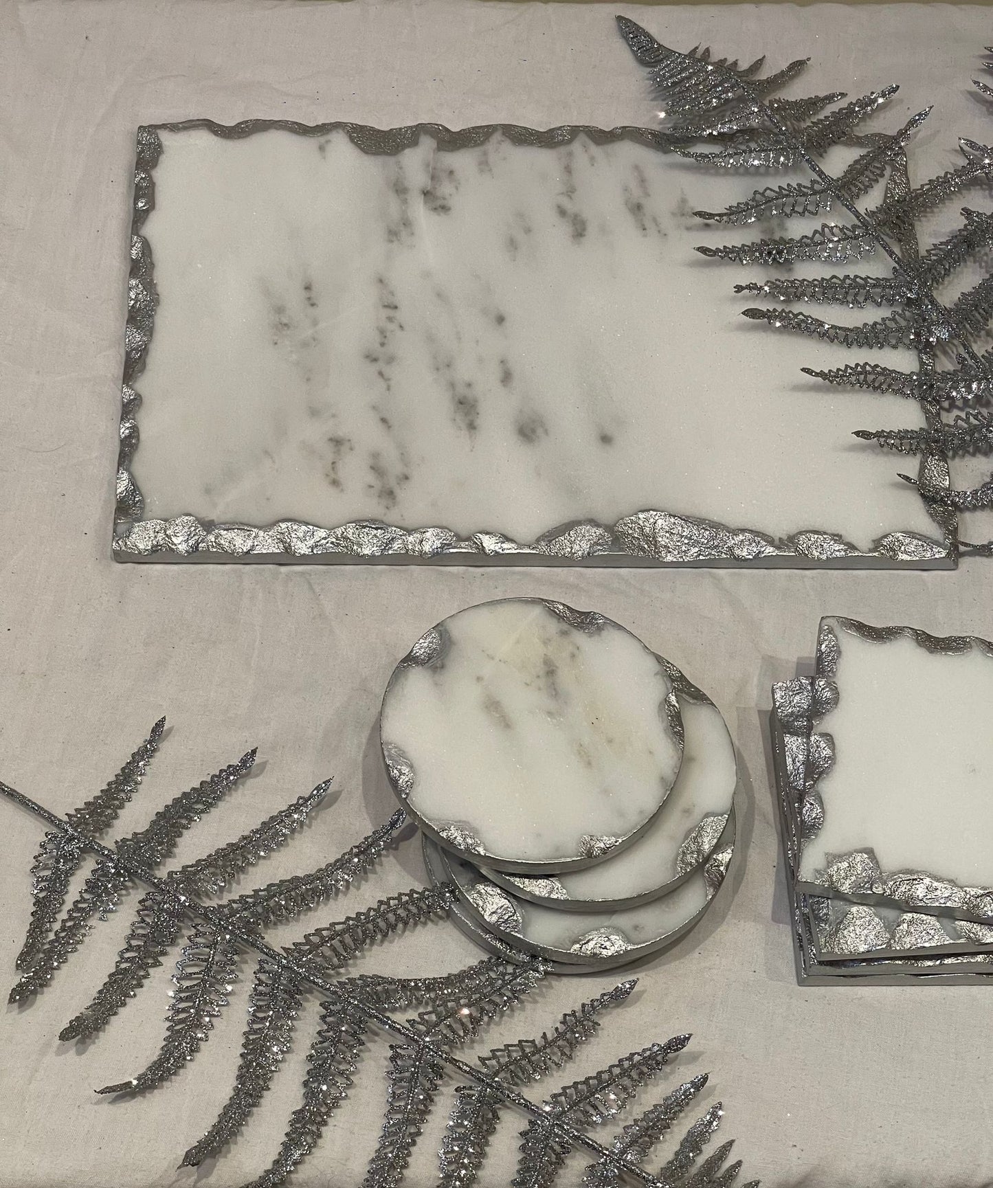 Luxury White Marble Effect Silver Edge Round Coasters – Set of Four